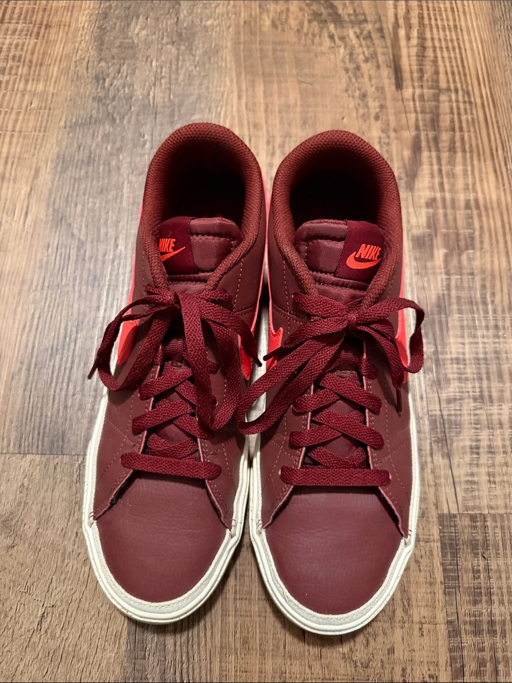 Nike Burgundy Low-Top Sneakers with Red Swoosh